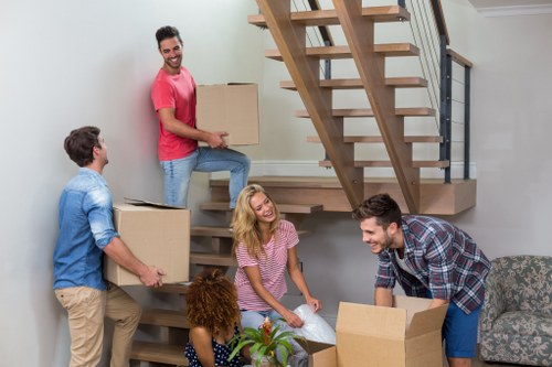 Packing and wrapping household items for a move in Wandsworth