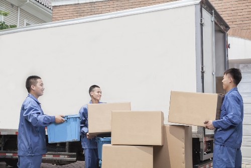 Removal van loading in a Wandsworth street with local residential properties