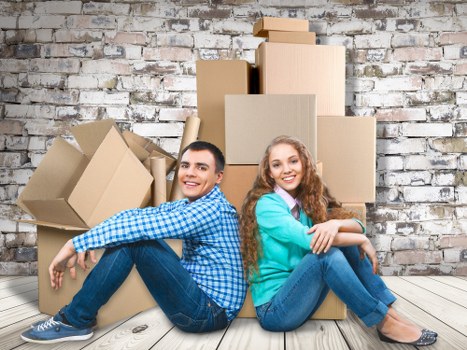 Packed office furniture and labelled moving boxes prepared for transport in Wandsworth