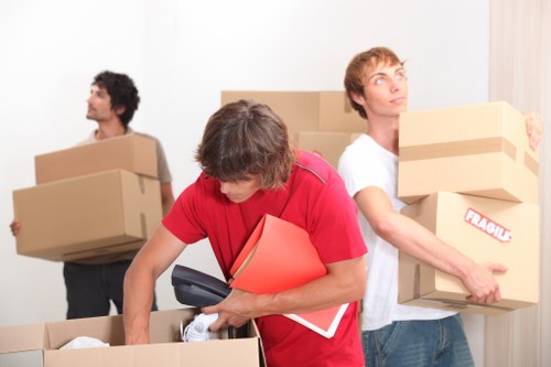 Business relocation team preparing furniture for transport