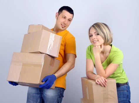 Boxes and labelled office items ready for transport