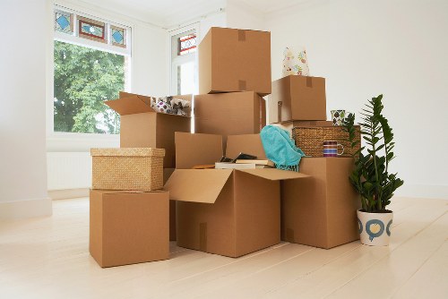 Professional movers loading furniture into a removal van in Wandsworth